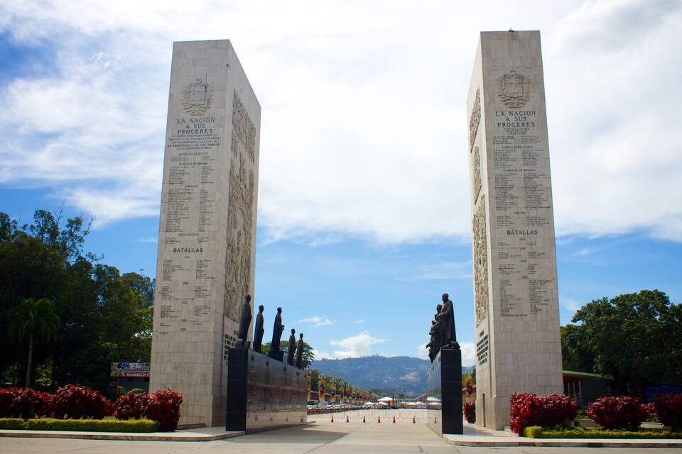A monument with inscriptions and statues.