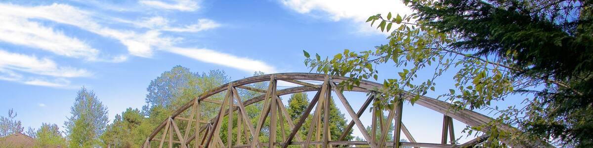 Park at Bothell Landing showing a river or creek and a bridge