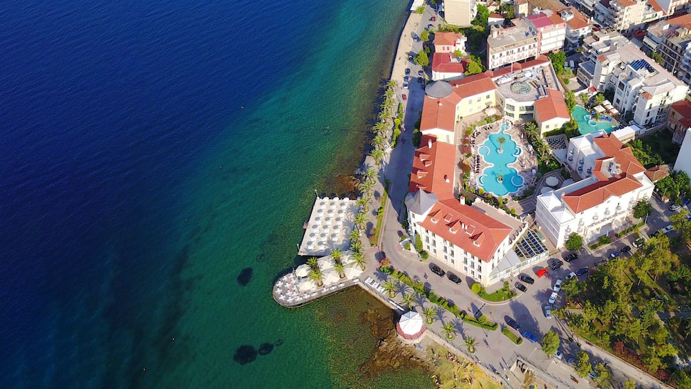 Aerial drone ultra wide photo of famous seaside village well known for thermal springs of Aidipsos, North Evia island, Greece