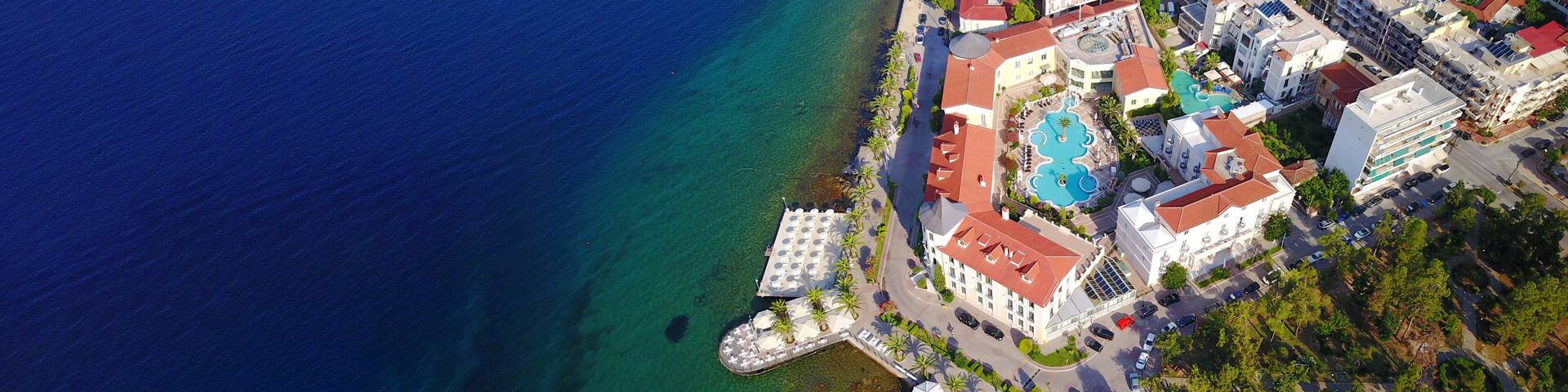 Aerial drone ultra wide photo of famous seaside village well known for thermal springs of Aidipsos, North Evia island, Greece