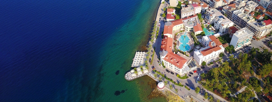 Aerial drone ultra wide photo of famous seaside village well known for thermal springs of Aidipsos, North Evia island, Greece