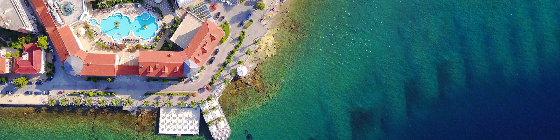 Aerial drone ultra wide photo of famous seaside village well known for thermal springs of Aidipsos, North Evia island, Greece