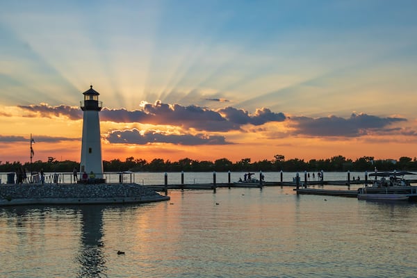 Sensational Sunset with a Lighthouse at a Marina