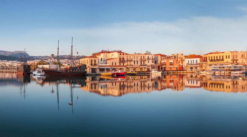 Panorama of old harbour in Rethymnon with lighthouse at sunrise Crete, Greece