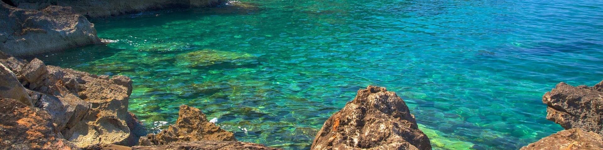 Gerani which includes rocky coastline