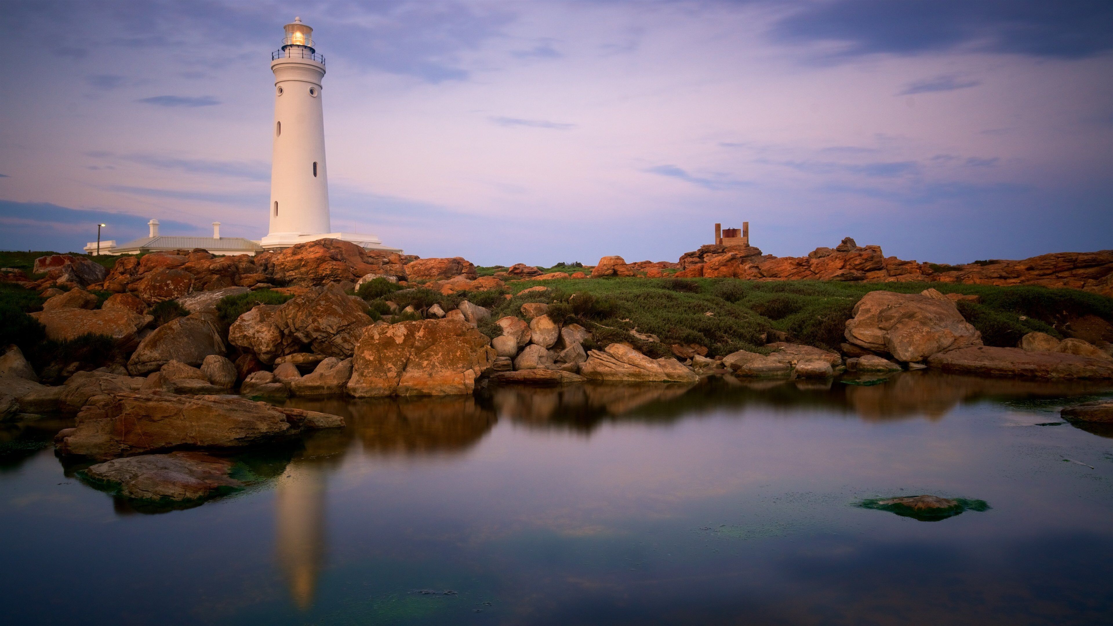 Seal Point Lighthouse which includes general coastal views, a lighthouse and a sunset
