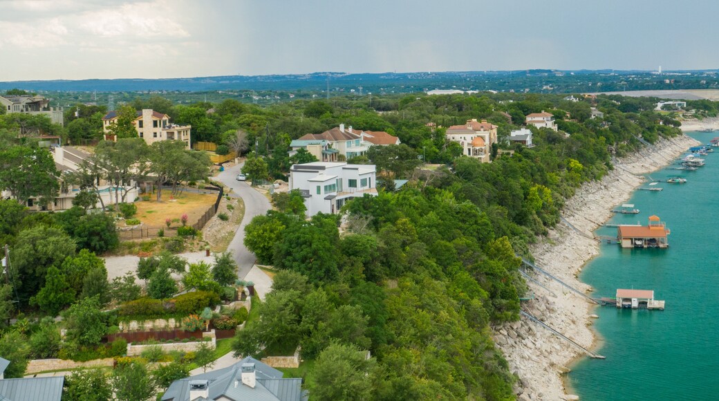 Lake Travis which includes general coastal views, landscape views and a coastal town