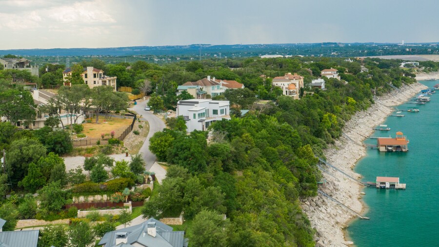 Lake Travis which includes general coastal views, landscape views and a coastal town