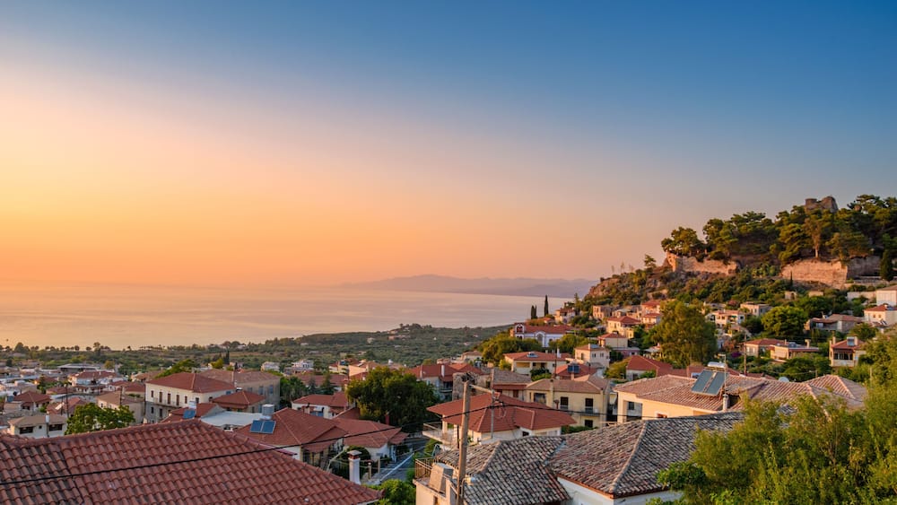 Sunset view over the picturesque coastal town of Kyparissia located in northwestern Messenia, Trifylia, Peloponnese, Greece.