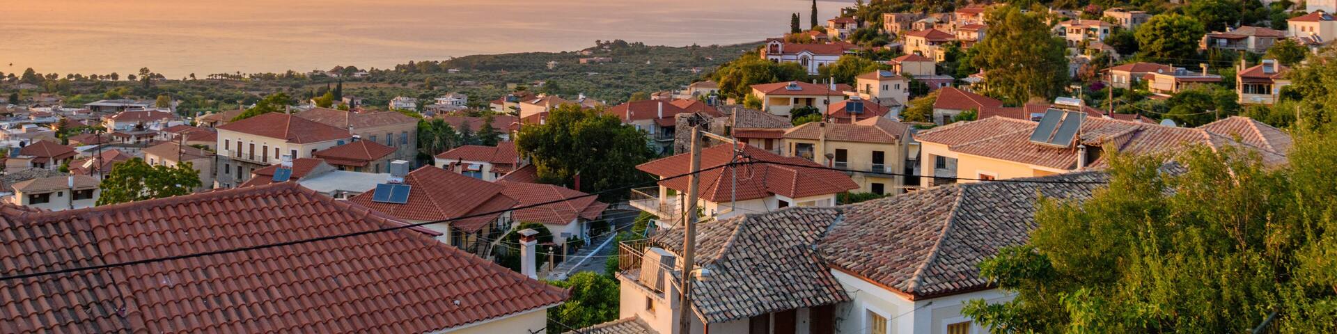 Sunset view over the picturesque coastal town of Kyparissia located in northwestern Messenia, Trifylia, Peloponnese, Greece.