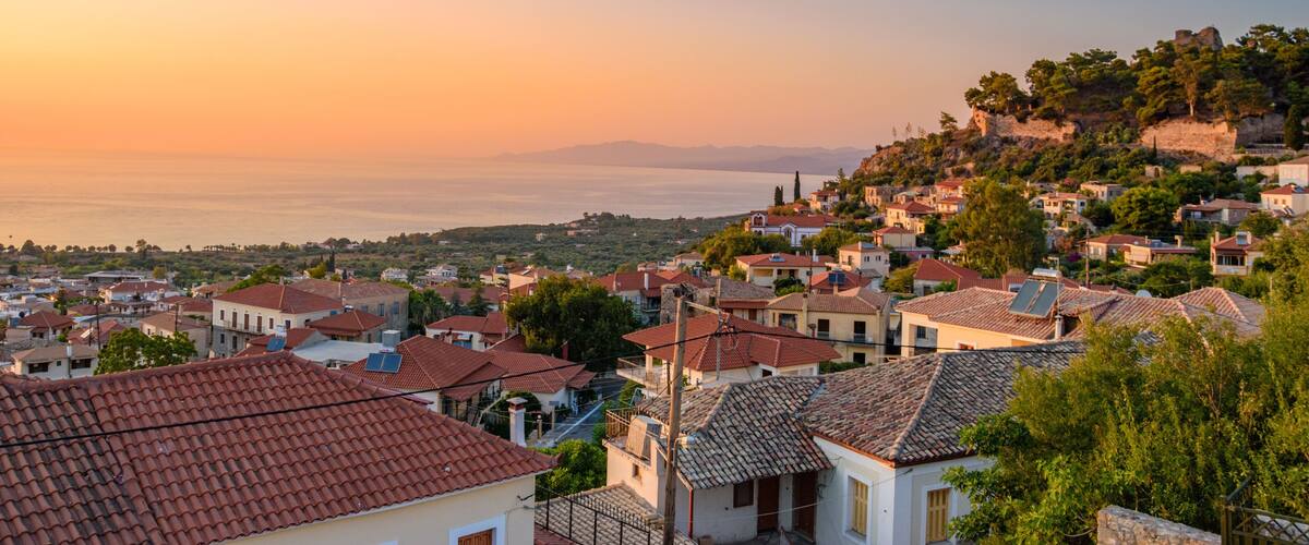 Sunset view over the picturesque coastal town of Kyparissia located in northwestern Messenia, Trifylia, Peloponnese, Greece.