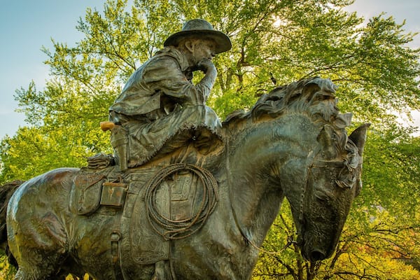 Pioneer Plaza which includes a statue or sculpture