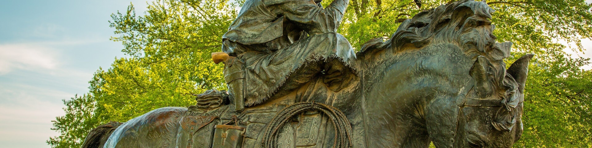 Pioneer Plaza which includes a statue or sculpture