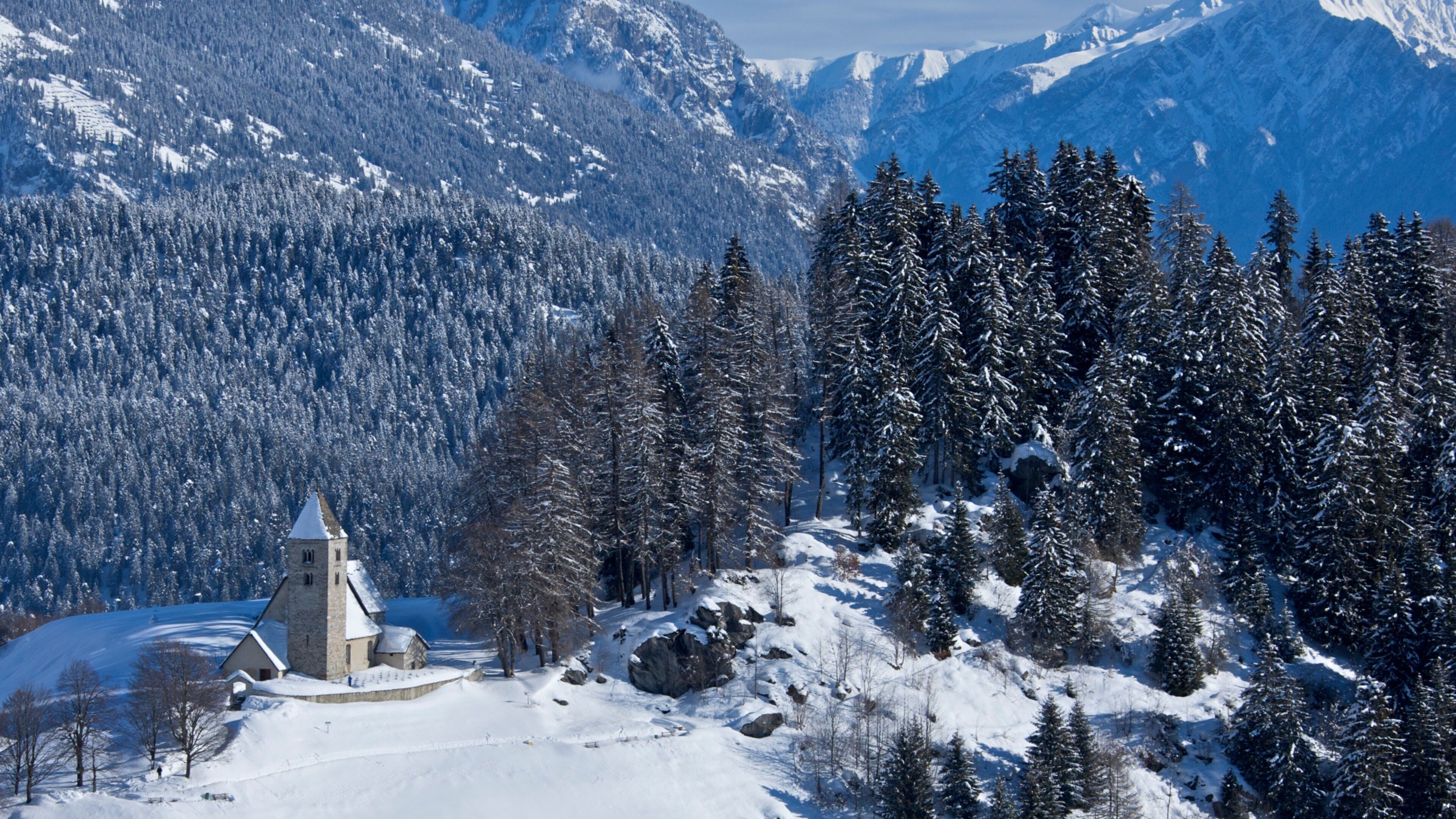 Falera featuring landscape views, snow and a church or cathedral