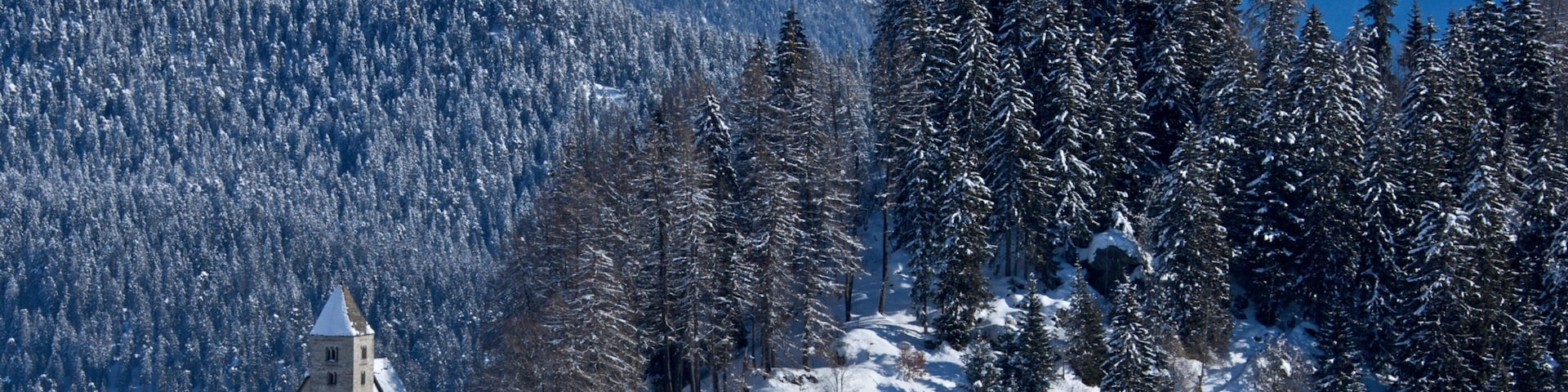 Falera featuring landscape views, snow and a church or cathedral