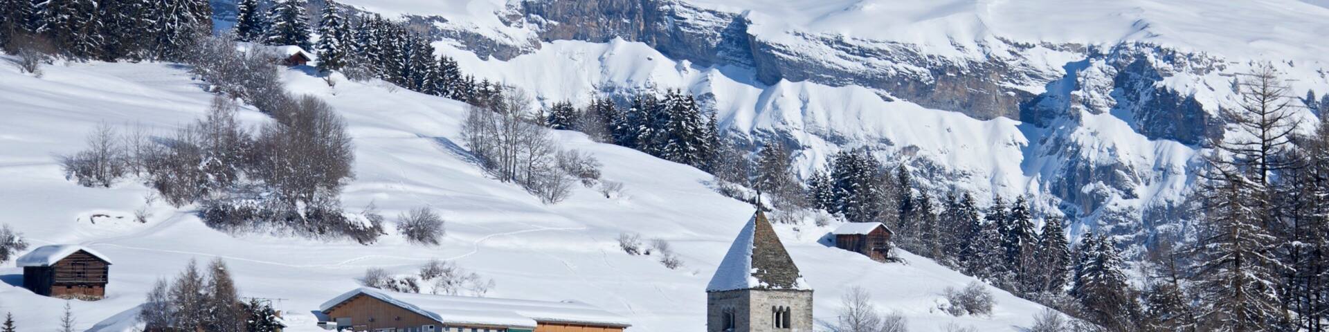 Falera showing snow, a small town or village and landscape views