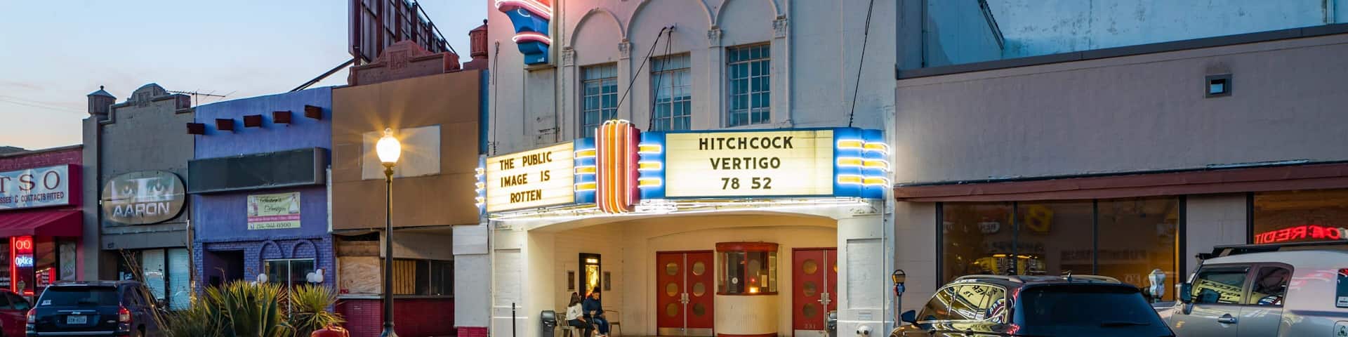 Texas Theatre showing signage and night scenes