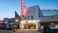 Texas Theatre showing signage and night scenes