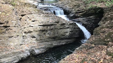 Nice smaller waterfalls. Park at the Tilapia restaurant as they have a trail that leads up to it. There is a $2 fee per person if you don't get food or a drink. We had lunch here. The food was great and the drinks cold.