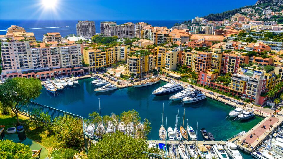 Yachts in bay near houses and hotels, Fontvielle, Monte-Carlo, Monaco, Cote d'Azur, French Riviera