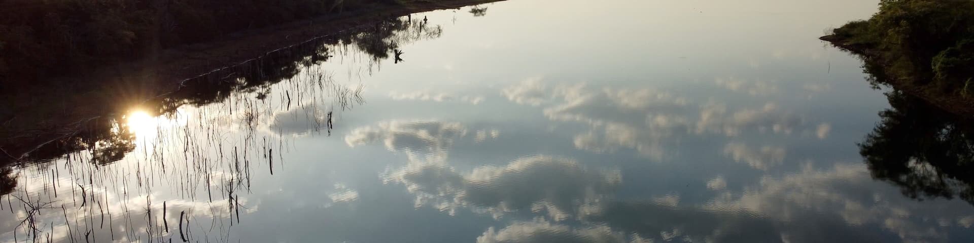 Sunset over a lake on the Brazilian Cerrado in the state of Goias
