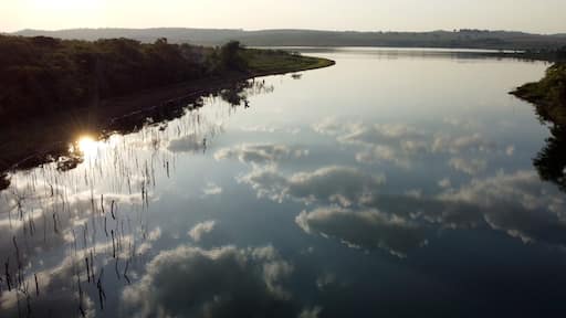 Sunset over a lake on the Brazilian Cerrado in the state of Goias