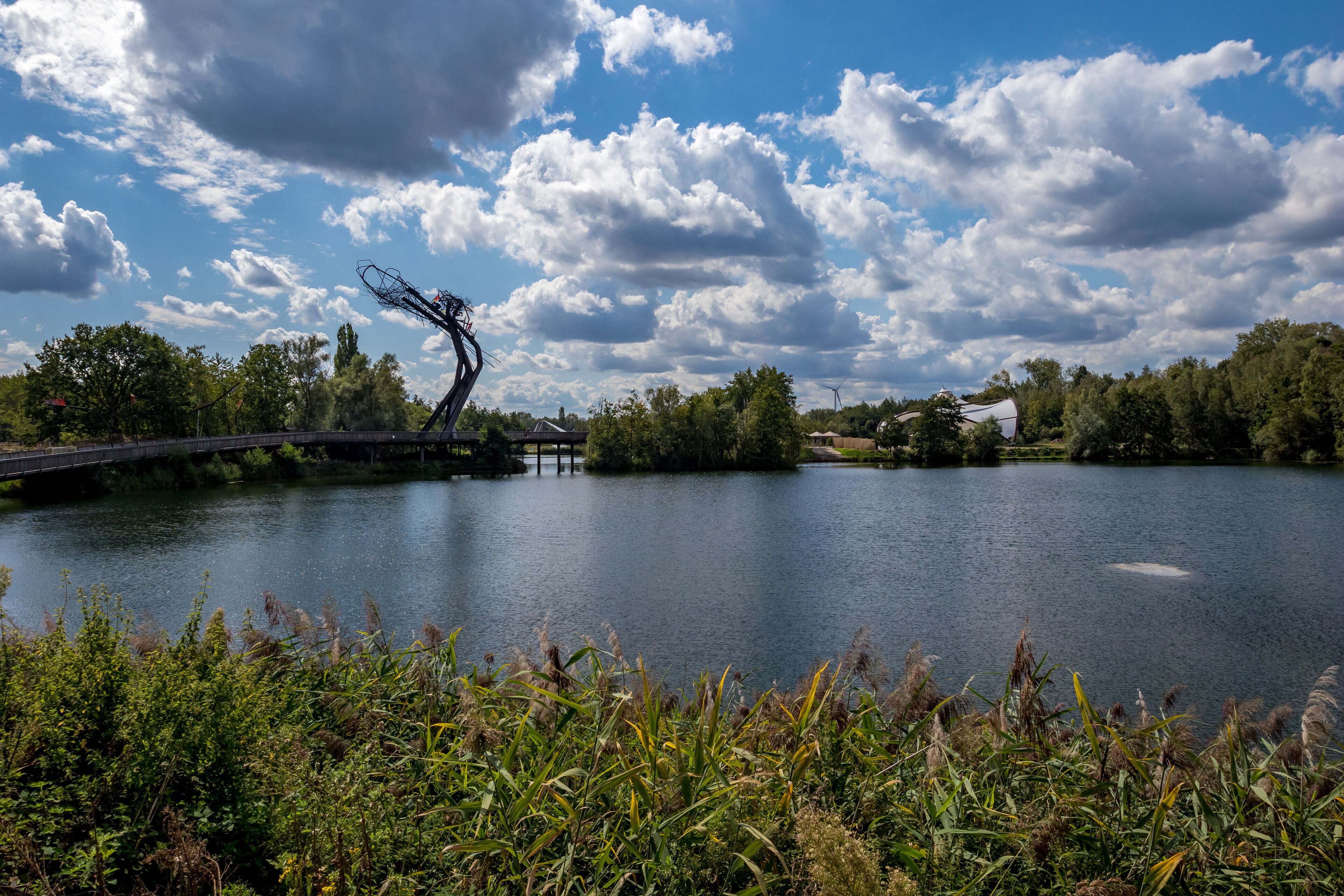 Lake and abstract art. Sunny September view from the park, Provinciaal Recreatiedomein De Schorre, Boom, Belgium