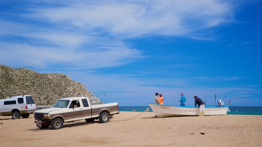 Los Frailes which includes a beach and general coastal views as well as a small group of people