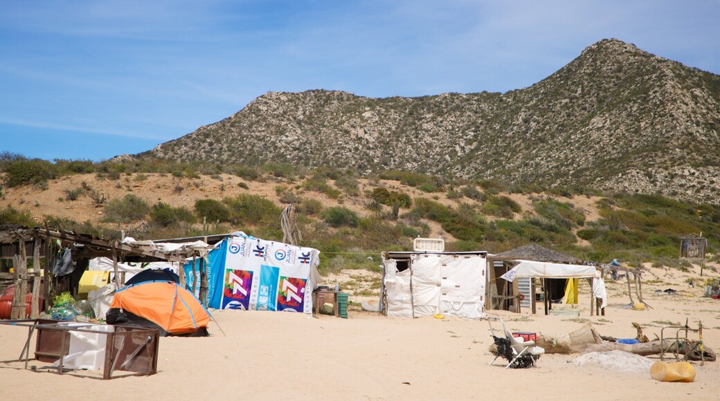 Los Frailes which includes a small town or village and a beach