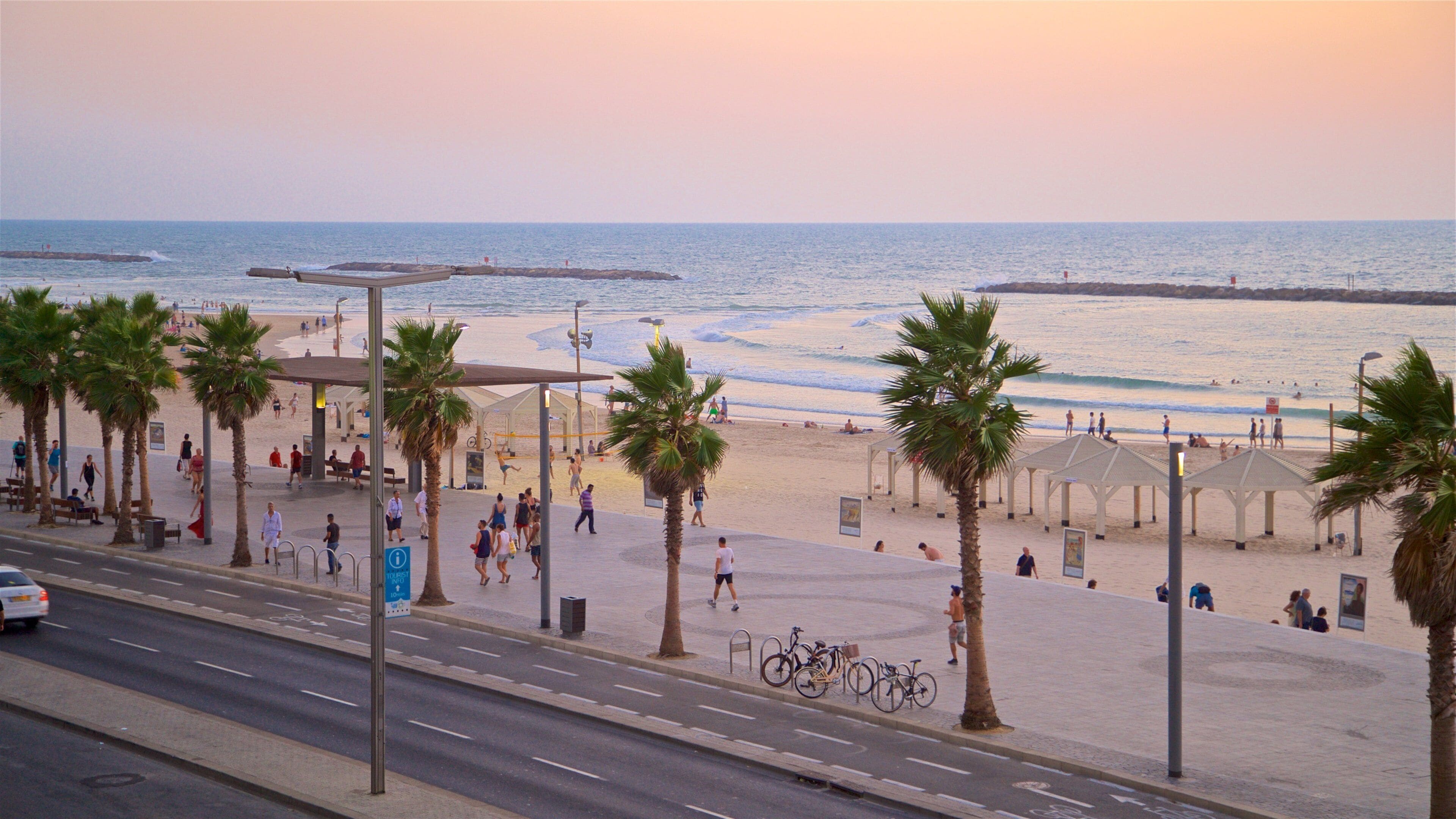 Bograshov Beach showing a sandy beach, a sunset and general coastal views