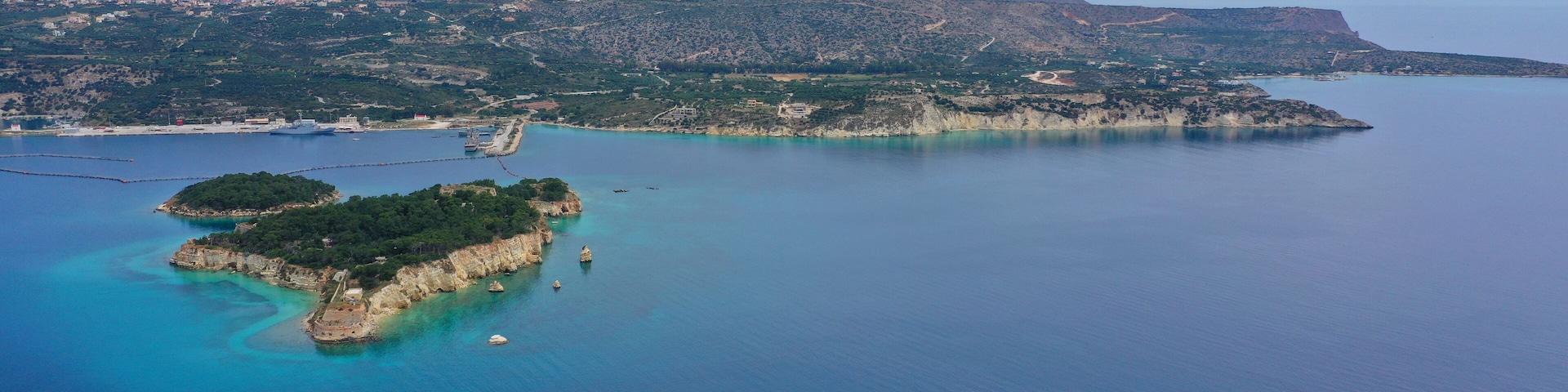 Aerial drone photo of famous Venetian fortified islet of Souda featuring small chapel of Agios Nikolaos, Chania, Crete island, Greece