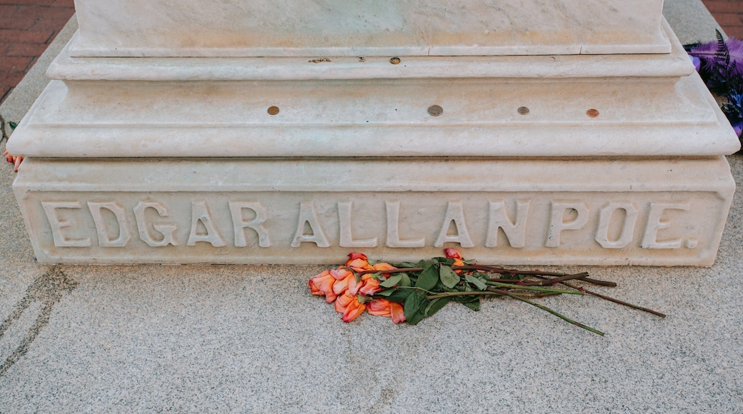 Edgar Allan Poe\'s Gravesite and Memorial showing a cemetery and flowers