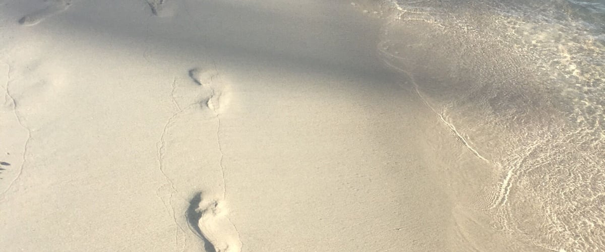 Warm waters lapping your feet, the softest white sand underfoot.