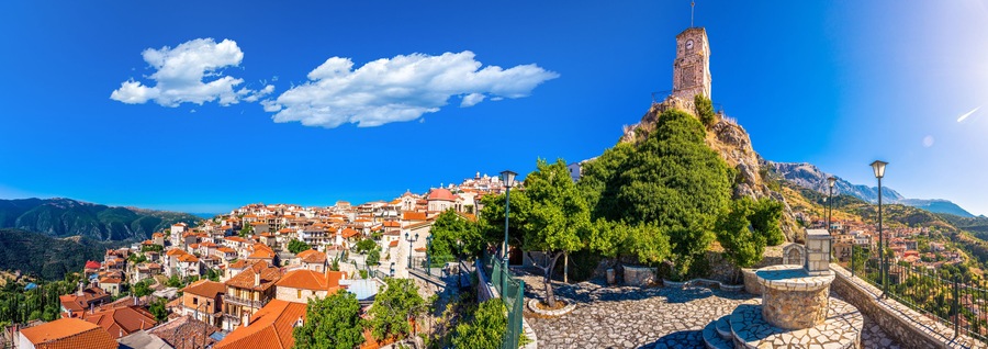 Scenic view of Arachova Village. Arachova is famous for its panoramic view, uphill small houses and the cobbled streets show a picturesque architecture at Parnassos Mountain, Greece.