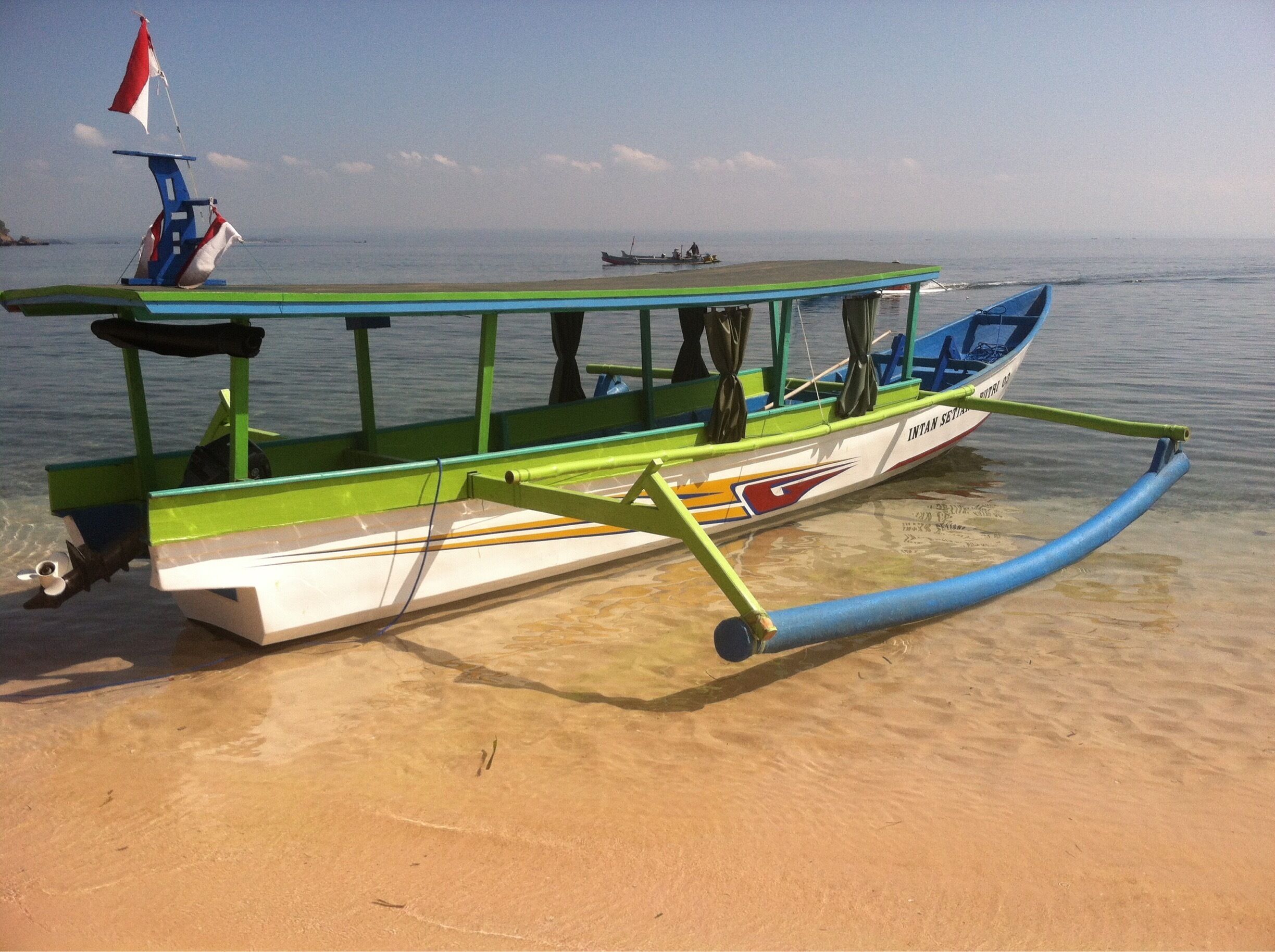 Charter a boat for some fishing at the Pink Beach in Lombok.