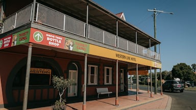 Oakey which includes signage and a small town or village