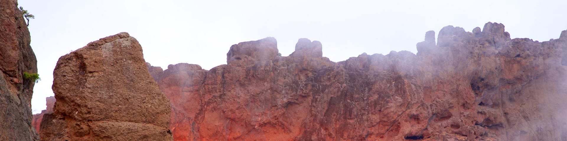 Nublo Rock featuring a gorge or canyon