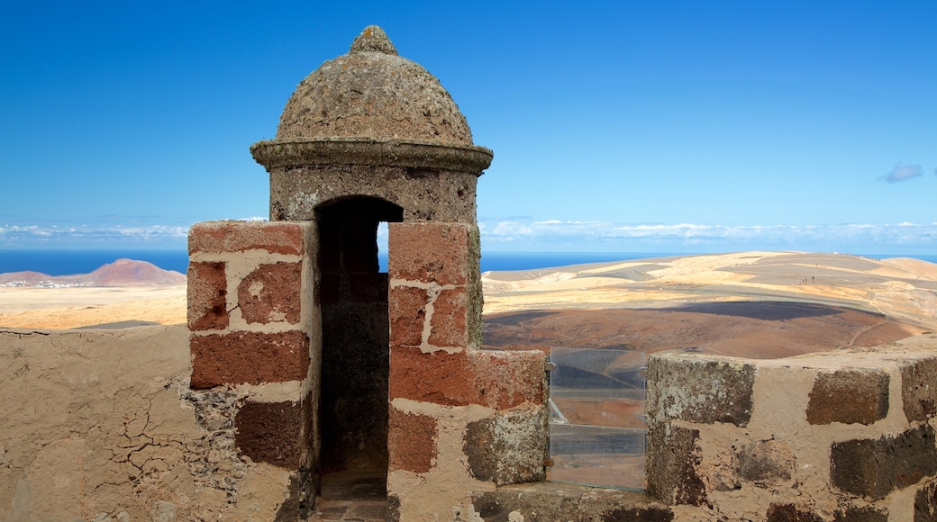 Santa Barbara Castle featuring a castle and desert views