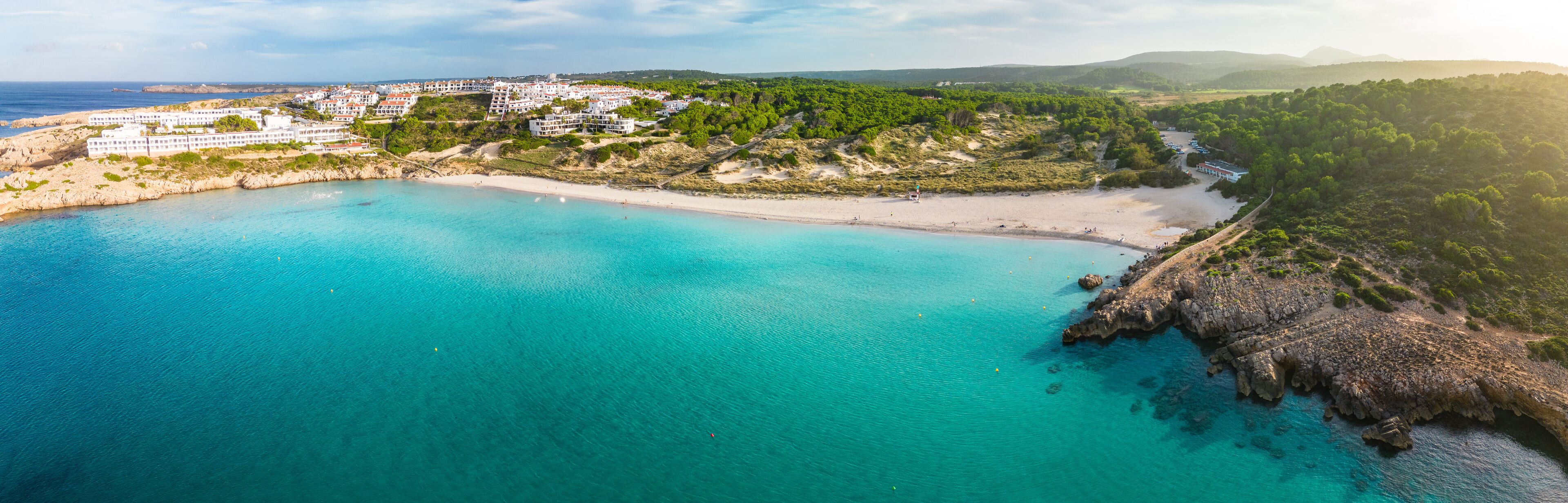 Areal drone view of Arenal de Son Saura beach at Menorca island, Spain