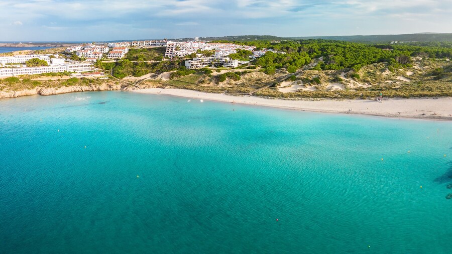 Areal drone view of Arenal de Son Saura beach at Menorca island, Spain