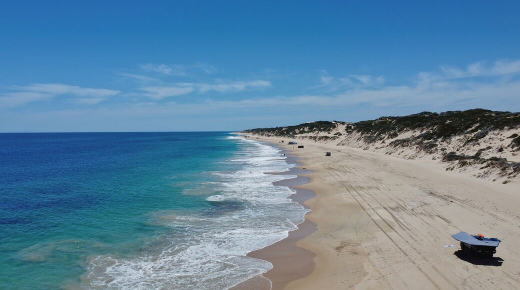 Drone, Christmas day, 4x4 driving (4WD) on Preston Beach, just south of Perth, Western Australia. Camp, swim and eat. Turquoise colored water, white sand dunes