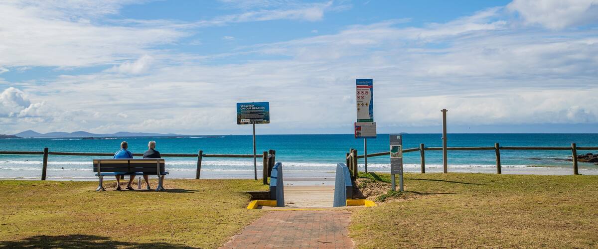 Woolgoolga Beach which includes general coastal views as well as a couple