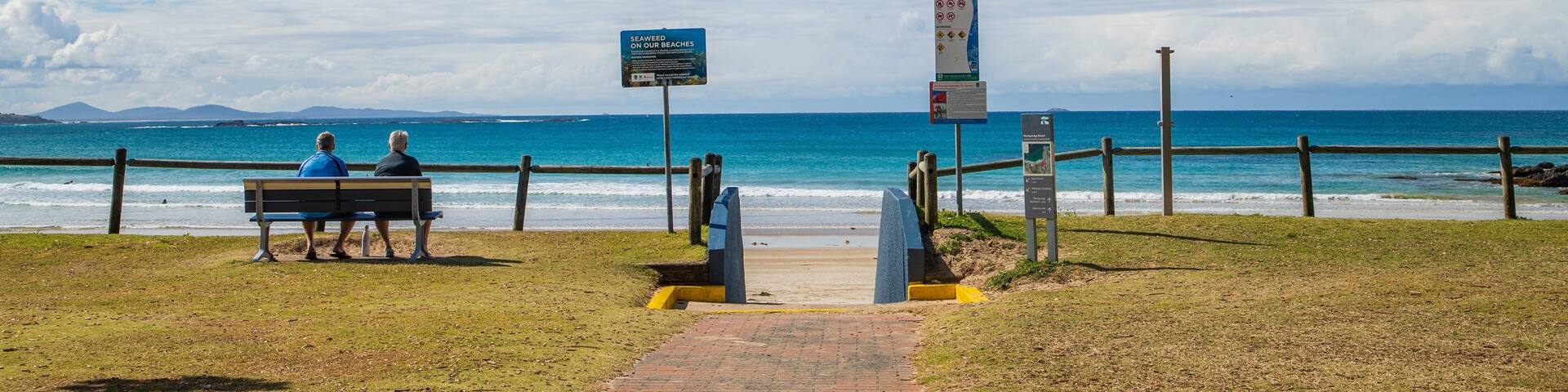 Woolgoolga Beach which includes general coastal views as well as a couple