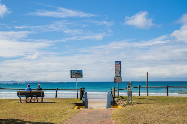 Woolgoolga Beach which includes general coastal views as well as a couple