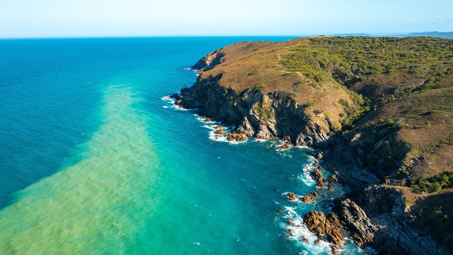 Byfield National Park featuring landscape views, rugged coastline and general coastal views
