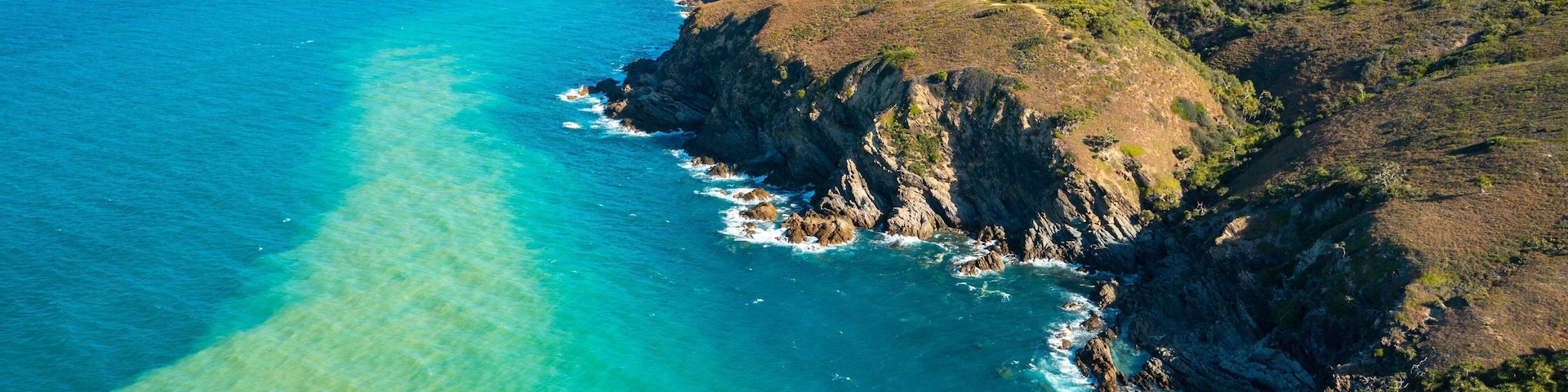 Byfield National Park featuring landscape views, rugged coastline and general coastal views