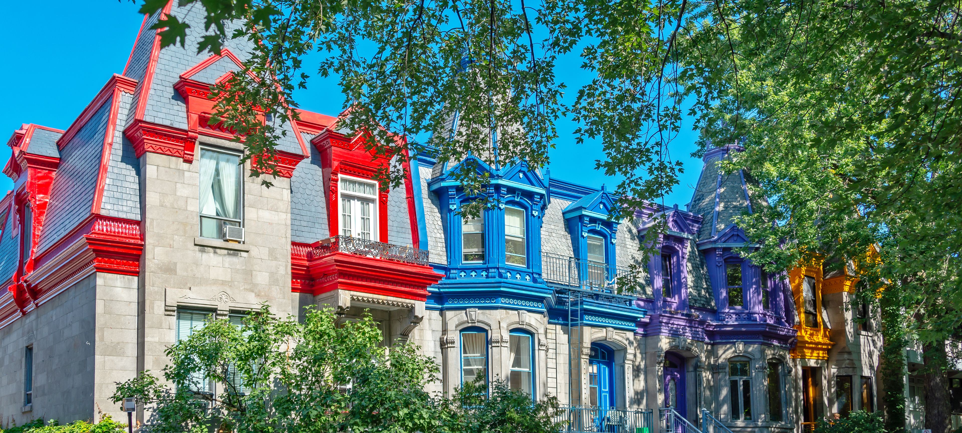 Pannorama of colorful Victorian houses in Le plateau Mont Royal borough in Montreal, Quebec