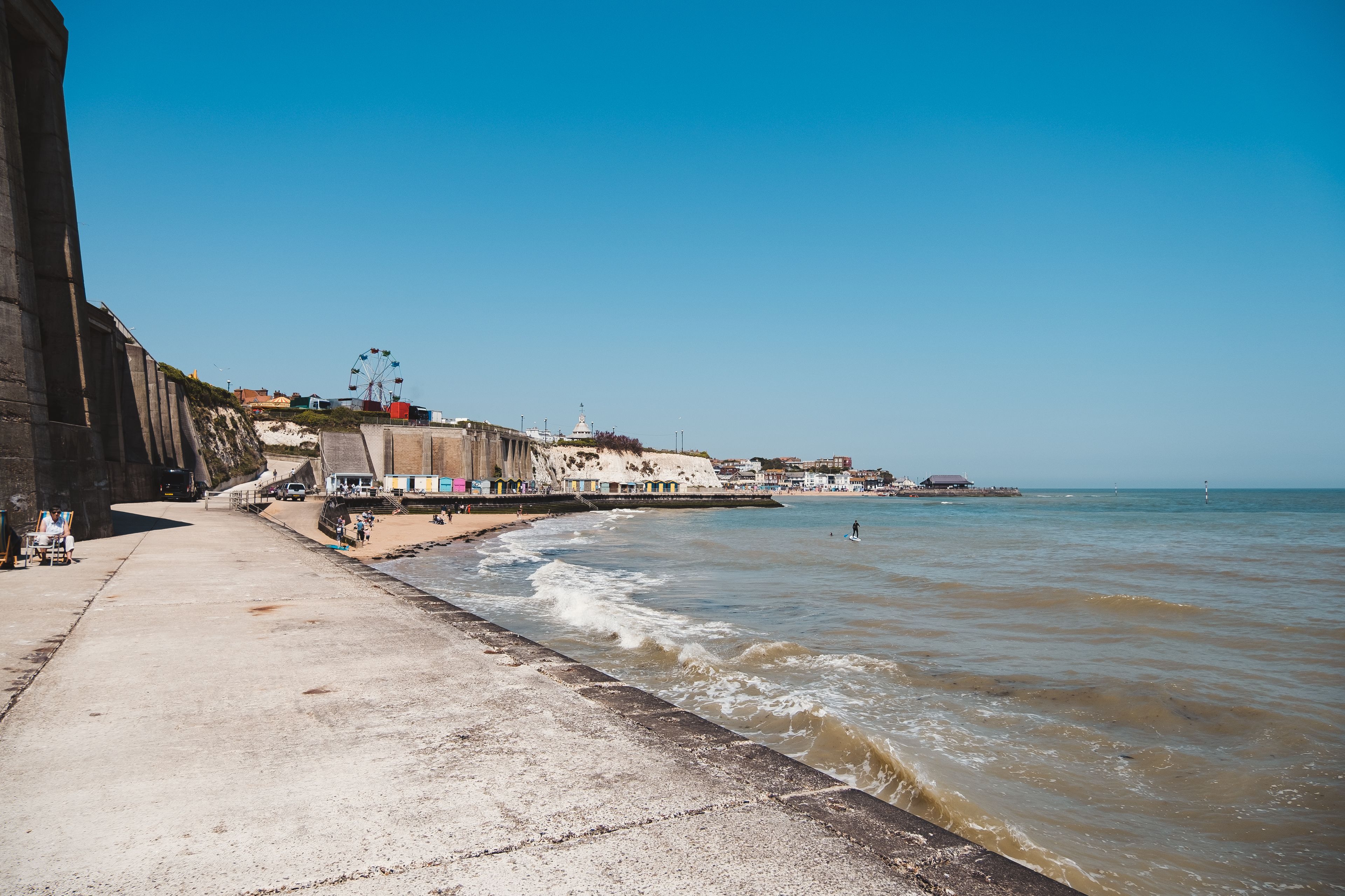 Beautiful sand beach in East England with wooden beach huts