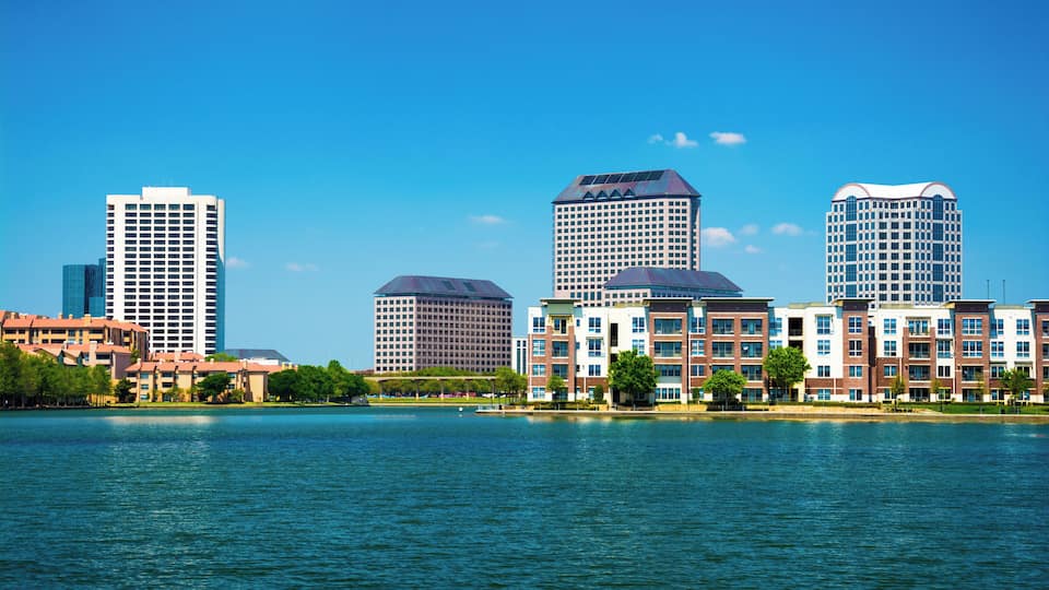 Skyline of the Las Colinas area of Irving, Texas with Lake Carolyn in the foreground. Irving is a part of the Dallas - Fort Worth Metroplex.