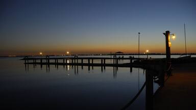 The daylight giving way to the night sky at the fishing pier at Chandlers Landing on Lake Ray Hubbard, Rockwall Texas.; Shutterstock ID 46904704